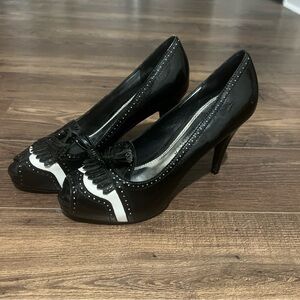 White House Black Market Tasseled Retro Black and White Heels